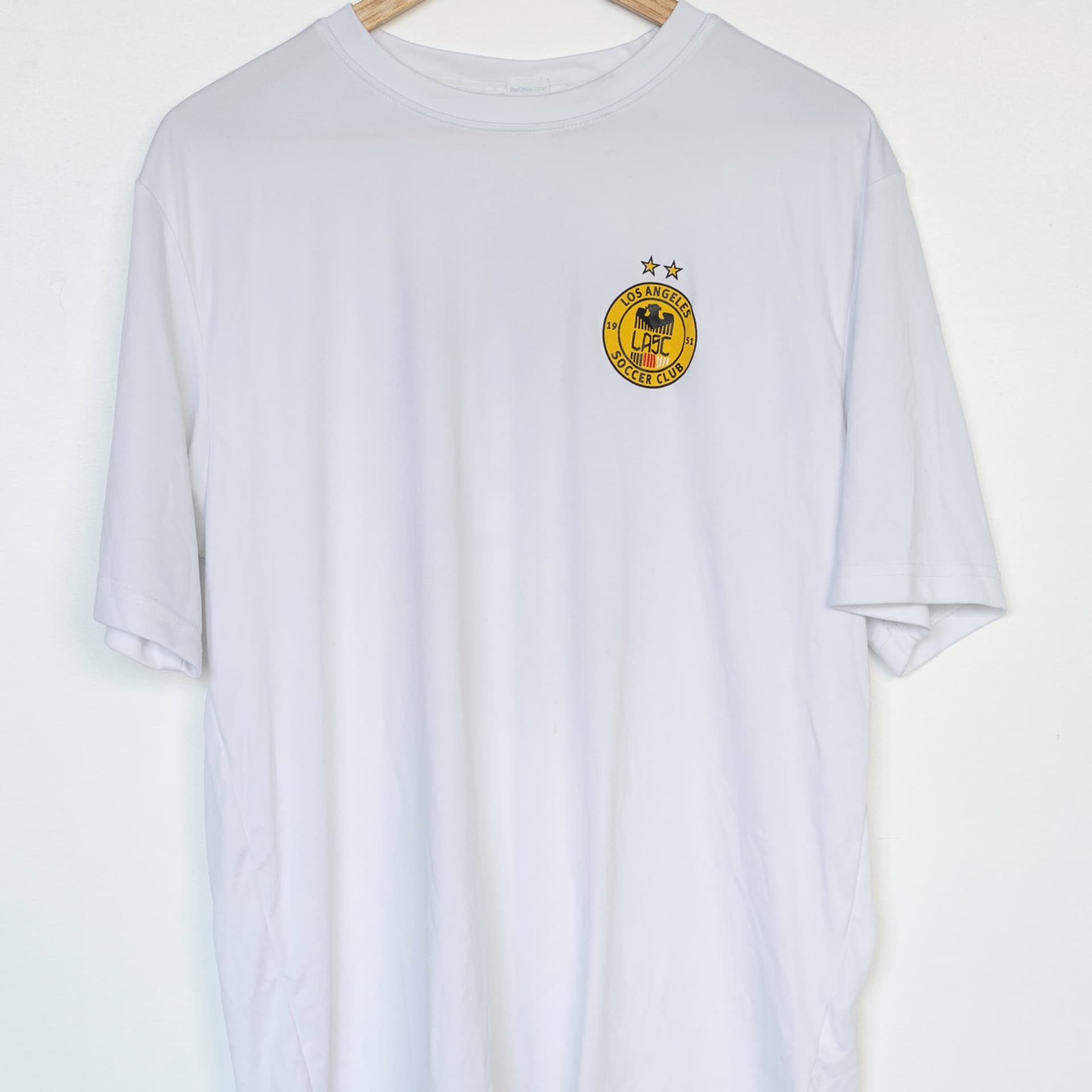 LASC athletic tee with screen printed design on front